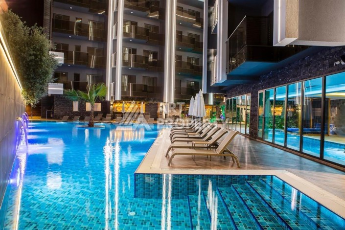 Современная квартира 1+1 в престижном комплексе в центре Алании. - Ракурс 17