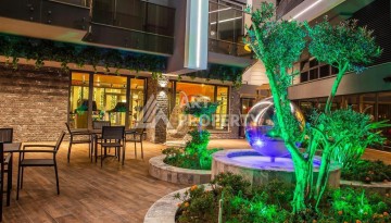 Современная квартира 1+1 в престижном комплексе в центре Алании. - Ракурс 20