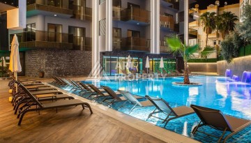 Современная квартира 1+1 в престижном комплексе в центре Алании. - Ракурс 21