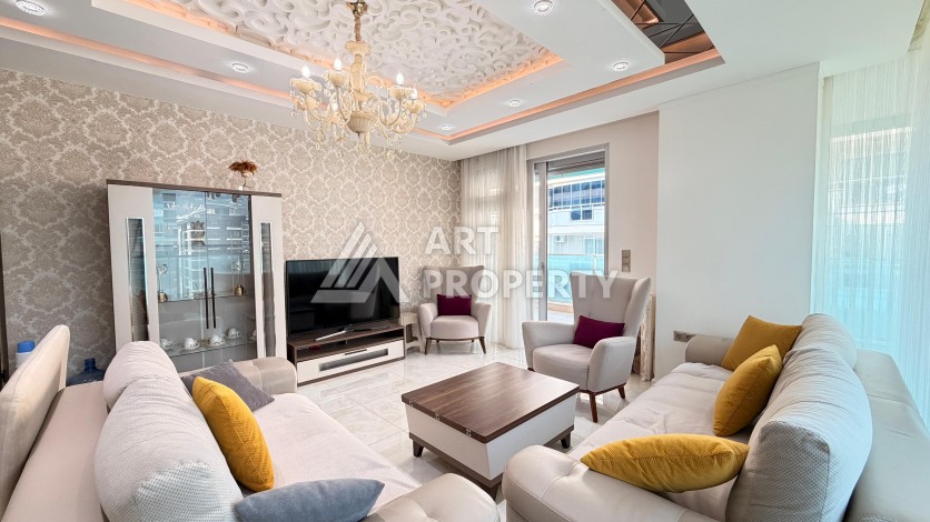 Просторная квартира 2+1 на первой линии в районе Махмутлар — идеальный вариант у самого моря. - Ракурс 1