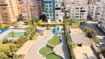 Просторная квартира 2+1 на первой линии в районе Махмутлар — идеальный вариант у самого моря. - Ракурс 21