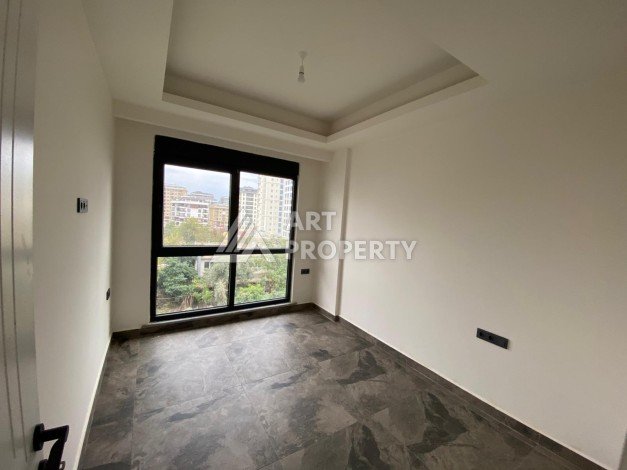 Уютная квартира 1+1 в современном комплексе в районе Махмутлар. - Ракурс 2