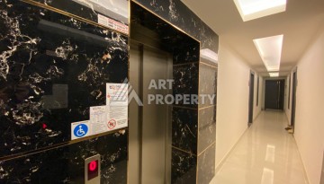 Уютная квартира 1+1 в современном комплексе в районе Махмутлар. - Ракурс 12