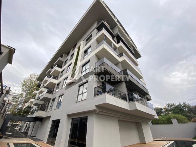 Уютная квартира 1+1 в современном комплексе в районе Махмутлар. - Ракурс 12