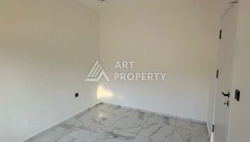 Квартира 1+1 в Алании, район Демирташ, 47 кв.м. - Ракурс 2