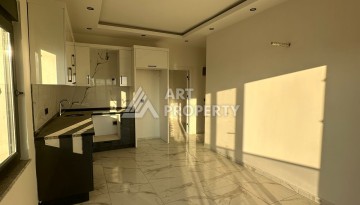 Квартира 1+1 в Алании, район Демирташ, 47 кв.м. - Ракурс 3