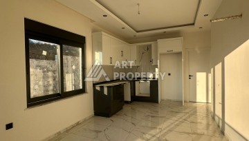 Квартира 1+1 в Алании, район Демирташ, 47 кв.м. - Ракурс 4