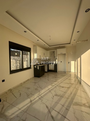 Квартира 1+1 в Алании, район Демирташ, 47 кв.м. - Ракурс 3