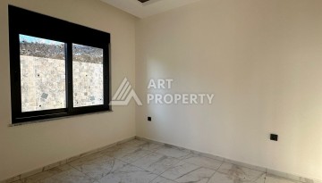 Квартира 1+1 в Алании, район Демирташ, 47 кв.м. - Ракурс 7