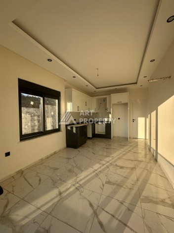 Квартира 1+1 в Алании, район Демирташ, 47 кв.м. - Ракурс 10