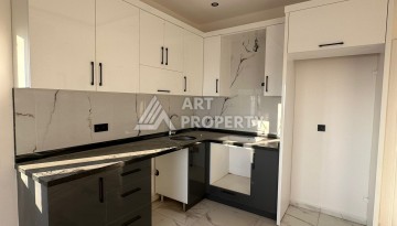 Квартира 1+1 в Алании, район Демирташ, 47 кв.м. - Ракурс 12