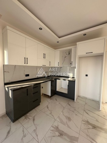 Квартира 1+1 в Алании, район Демирташ, 47 кв.м. - Ракурс 11