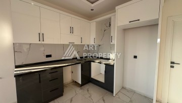 Квартира 1+1 в Алании, район Демирташ, 47 кв.м. - Ракурс 13