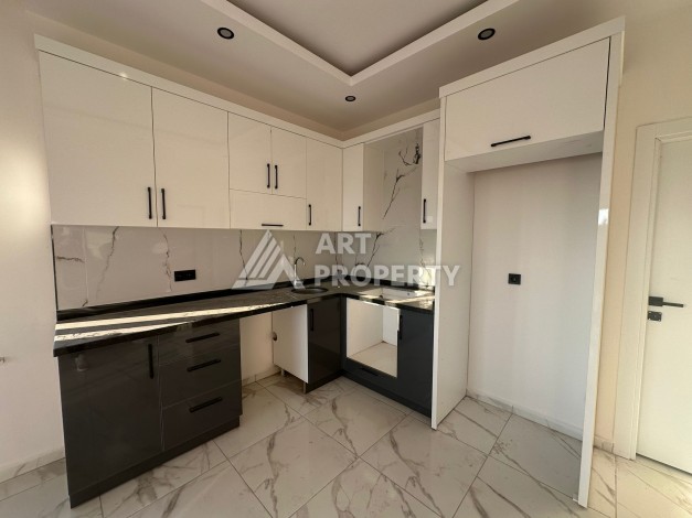 Квартира 1+1 в Алании, район Демирташ, 47 кв.м. - Ракурс 12