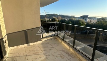 Квартира 1+1 в Алании, район Демирташ, 47 кв.м. - Ракурс 16