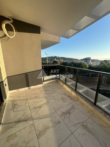 Квартира 1+1 в Алании, район Демирташ, 47 кв.м. - Ракурс 15