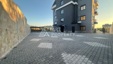 Квартира 1+1 в Алании, район Демирташ, 47 кв.м. - Ракурс 17