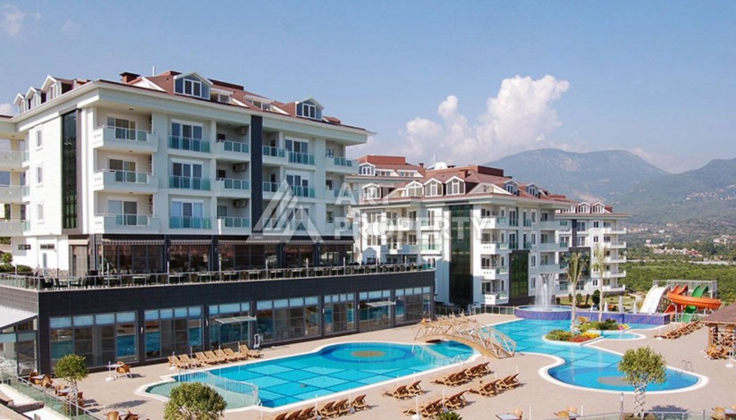 Просторная квартира 1+1 в элитной резиденции района Джикджилли, 65 кв.м. - Ракурс 0