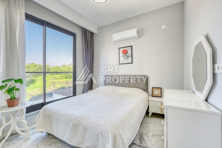 Современная квартира 1+1 в новом комплексе в районе Махмутлар — стильное решение для жизни у моря. - Ракурс 1