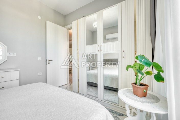 Современная квартира 1+1 в новом комплексе в районе Махмутлар — стильное решение для жизни у моря. - Ракурс 2