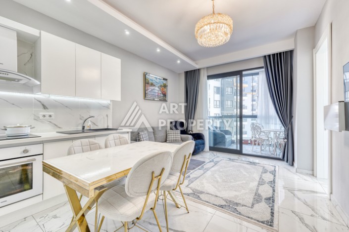 Современная квартира 1+1 в новом комплексе в районе Махмутлар — стильное решение для жизни у моря. - Ракурс 0