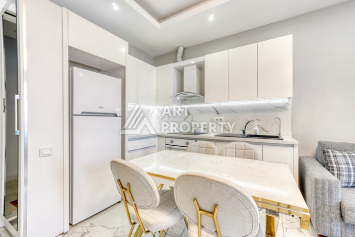 Современная квартира 1+1 в новом комплексе в районе Махмутлар — стильное решение для жизни у моря. - Ракурс 3