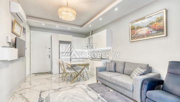 Современная квартира 1+1 в новом комплексе в районе Махмутлар — стильное решение для жизни у моря. - Ракурс 5