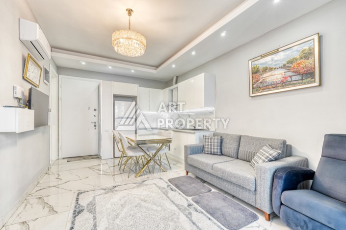 Современная квартира 1+1 в новом комплексе в районе Махмутлар — стильное решение для жизни у моря. - Ракурс 4