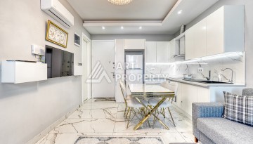 Современная квартира 1+1 в новом комплексе в районе Махмутлар — стильное решение для жизни у моря. - Ракурс 6