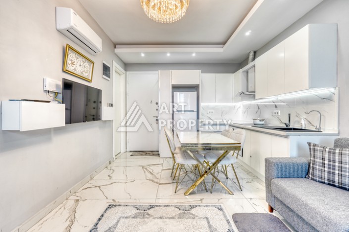 Современная квартира 1+1 в новом комплексе в районе Махмутлар — стильное решение для жизни у моря. - Ракурс 5