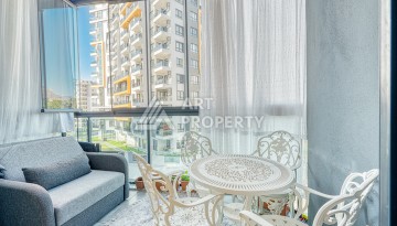 Современная квартира 1+1 в новом комплексе в районе Махмутлар — стильное решение для жизни у моря. - Ракурс 7