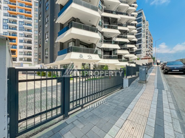 Современная квартира 1+1 в новом комплексе в районе Махмутлар — стильное решение для жизни у моря. - Ракурс 8