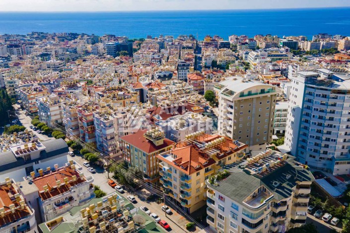 Квартира 2+1 с отдельной кухней в центре Алании, 100 кв.м. - Ракурс 1