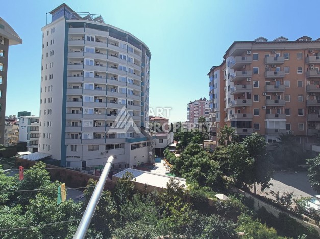 Квартира 2+1 с отдельной кухней в центре Алании, 100 кв.м. - Ракурс 4