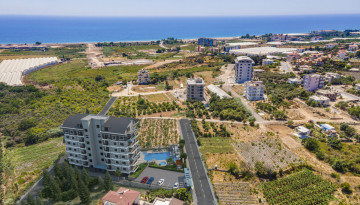 Инвестиционный проект в регионе Демирташ, Алания со своим пляжем. - Ракурс 1