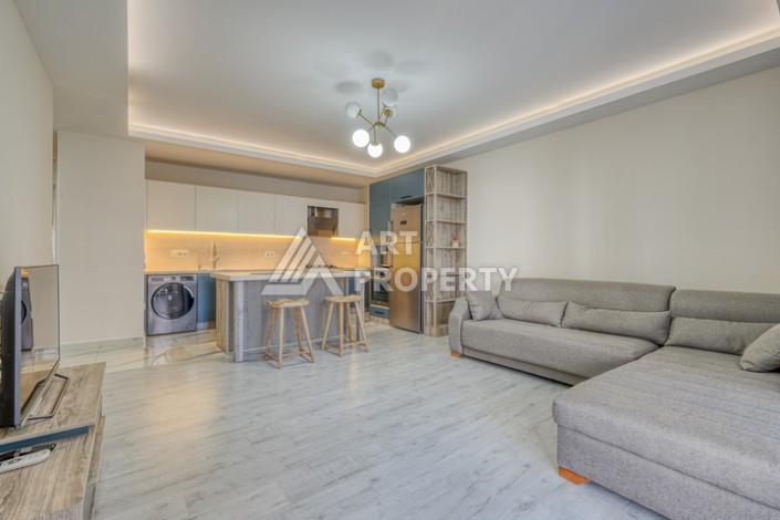 Просторная квартира 1+1 в Махмутларе, 80 кв.м. - Ракурс 2