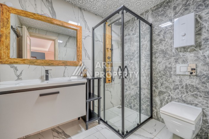 Просторная квартира 1+1 в Махмутларе, 80 кв.м. - Ракурс 18