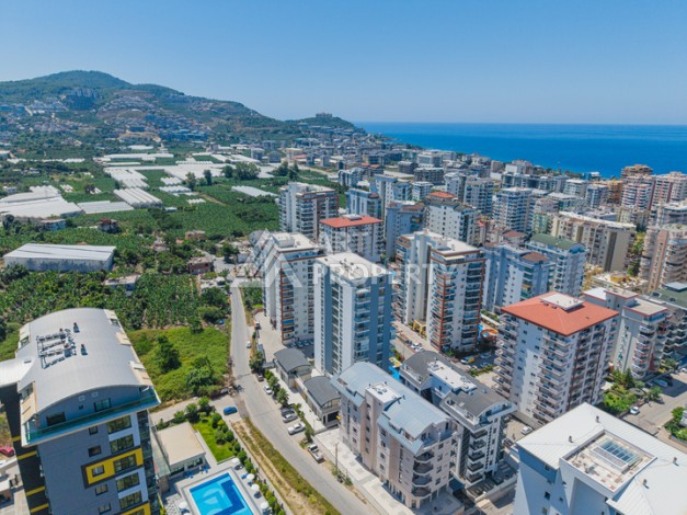 Просторная квартира 1+1 в Махмутларе, 80 кв.м. - Ракурс 29