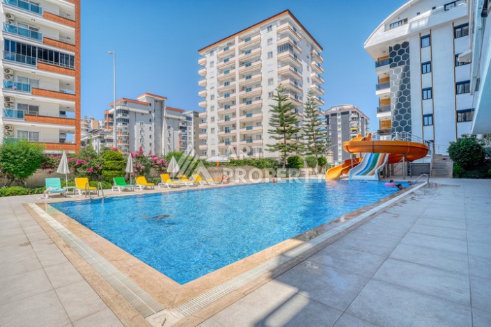 Просторная квартира 1+1 в Махмутларе, 80 кв.м. - Ракурс 33