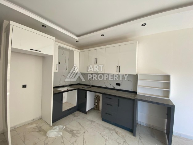 Уютная квартира 2+1 в новом доме в районе Демирташ — отличный вариант по доступной цене. - Ракурс 2