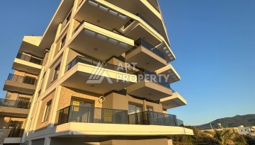 Уютная квартира 2+1 в новом доме в районе Демирташ — отличный вариант по доступной цене. - Ракурс 19