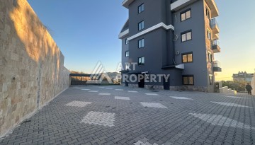 Уютная квартира 2+1 в новом доме в районе Демирташ — отличный вариант по доступной цене. - Ракурс 20