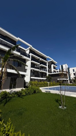 Современная квартира 1+1 в новом комплексе в районе Алтынташ (Анталья). - Ракурс 0