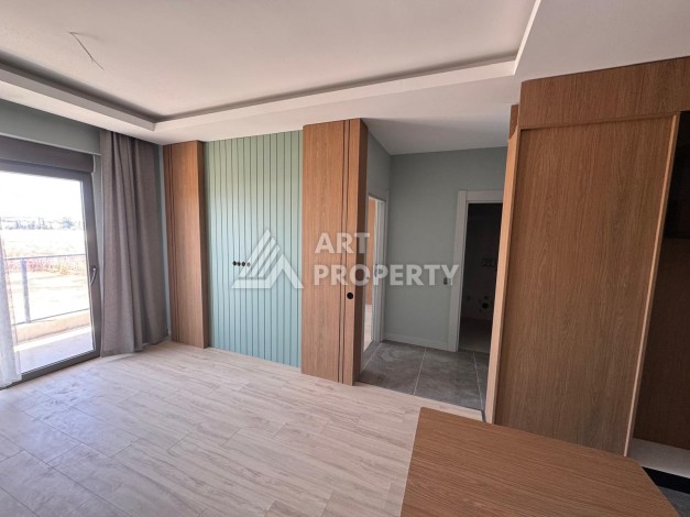 Современная квартира 1+1 в новом комплексе в районе Алтынташ (Анталья). - Ракурс 1