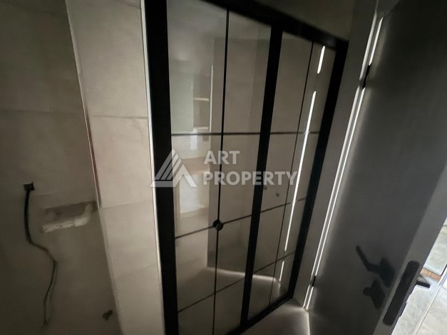 Современная квартира 1+1 в новом комплексе в районе Алтынташ (Анталья). - Ракурс 15