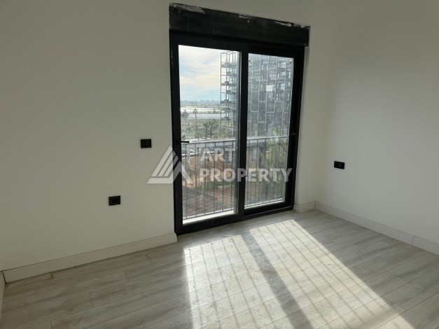 Апартаменты 1+1 в новом комплексе в районе Алтынташ (Анталья). - Ракурс 6