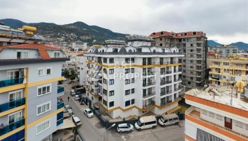 Продается квартира в центре Алании в доме с богатой инфраструктурой - Ракурс 1