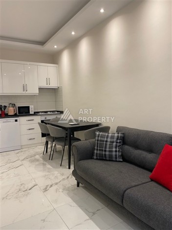 Уютная меблированная квартира 1+1 в центре Алании — идеальный вариант для жизни и инвестиций у моря - Ракурс 2