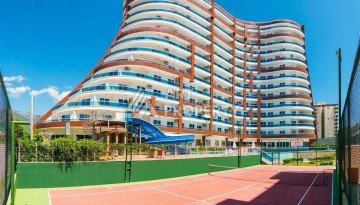 Квартира-студия в центре Махмутлара, рези денция отельного типа, море в 500 метрах - Ракурс 1