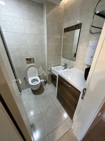 Квартира-студия в центре Махмутлара, рези денция отельного типа, море в 500 метрах - Ракурс 3